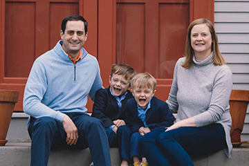 Kari Diamond Kayiatos '97 and family. Links to her story