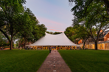 A reunion party underneath a tent. Links to Gifts of Real Estate A reunion party underneath a tent. Links to Gifts of Real Estate
