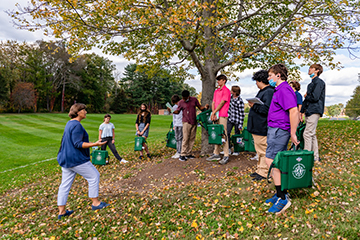 A class picking up leaves outside. Links to Tangible Personal Property A class picking up leaves outside. Links to Tangible Personal Property